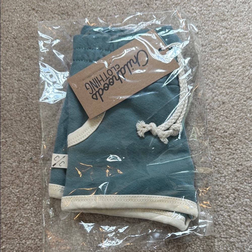 Childhoods Clothing Shorts. Size 6-12months. Color is Rainwater